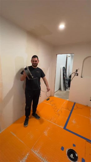 Scott + Layn | DIY Home Renovation on Instagram: "toasty toes 👣 so how much did this cost?? our bathroom is ~72sqft and it was around $1300 total to install! we thought it would be at least 3x that for this upgrade and it was very easy to install ourselves 💸 🛒 comment ‘SUPPLIES’ for a list of everything we used for this project! #diyhomerenovation #bathroomreno #heatedfloors"
