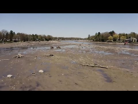 Lake vanishes after Michigan dam fails during record flooding