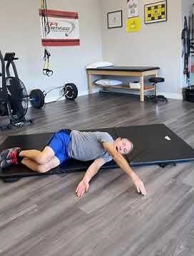 Open book thoracic mobility drill