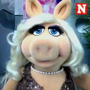 Miss Piggy spills all on the new Disney+ special "Muppets Haunted Mansion" and why she doesn't need to wear a costume on Halloween. Thumb credit: Associated Press | Newsweek | Facebook