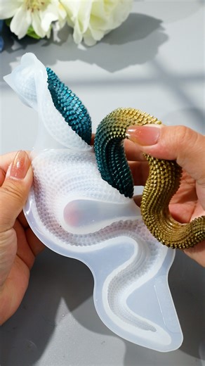 15K views · 130 reactions | Demolding time for the crystal snake mold! ✨ Which one are you most excited to try? We can’t wait to see your creativity shine—share your version in the comments below! Let’s inspire each other with what we create!  Still don’t have the mold? Click the link below to shop now!  Amazon store: https://amzn.to/3QN9r5y Official website: https://letsresin.com/CSRMFF #LetsResin #resinart #ResinSnake #siliconemolds #snake | Let's Resin | Facebook