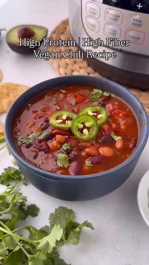 This hearty Instant Pot vegan chili recipe is perfect for busy weeknights. It’s packed with protein-rich beans, veggies, and lots of flavor, but it’s surprisingly easy to make! Plus, each serving has 17g of fiber and 21g of protein! Comment “recipe” and I’ll send you the recipe! #vegansoups #vegandinnerideas #highfiber https://iheartvegetables.com/instant-pot-vegan-chili/ | I Heart Vegetables