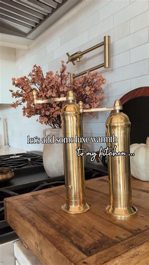 Let’s add some warmth to the kitchen ✨ I’ve been searching for the perfect salt pepper mills that feel timeless, functional, and beautiful — and these solid brass pieces are it. Handmade in Greece with heirloom character, they bring that soft, golden glow and old-world charm that instantly elevates the countertop. Designer look, built to last, and truly boujee on a budget 🤍 Follow comment “shop” for links. #BoujeeOnABudgetHome #KitchenStyling #NeutralHomeDecor #BrassDetails #TimelessDesign #Hom