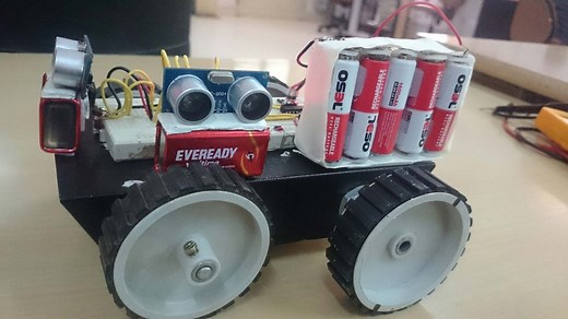 Efficient Wall Following Robot with Ultrasonic Sensor that Works in both Indoor and Outdoor Environments