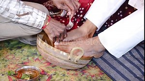 Authentic Indian marriage vidhi video showing traditional Hindu wedding rituals and sacred ceremonies. Features bride and groom performing wedding customs, Vedic rituals, priests, sacred fire (havan),