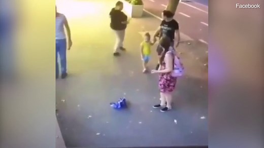Horrifying moment crazed knifewoman stabs small child in the eye