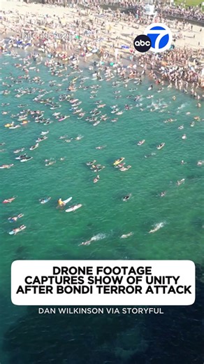 ABC7 Eyewitness News on Instagram: "In the first full day of opening since a mass shooting driven by antisemitism killed 15 people at Australia's famed Bondi Beach on Sunday, thousands of people returned to the waterfront Friday to commemorate the losses and try to heal through a sense of community. Link in bio for more."