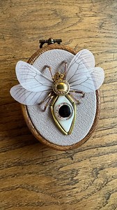 23K views · 15K reactions | A little glass fleye Featuring repurposed jewellery, Hesse cloth wings and a fused eye made by @sandandfireworks | Atypical curiosities | Facebook