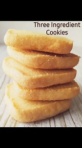 THREE INGREDIENT COOKIES Ingredients - 6 oz. (3/4 cup) butter, room temp. - 3.5 oz. (1/2 cup) superfine sugar - 9 oz. (2 1/4 cups) all purpose flour Raw sugar or large-granulated sugar for coating (1/2 cup is plenty) Instructions Beat butter with sugar in a mixer until light and fluffy. Then sift the flour into the bowl and knead the dough. Lay the dough on a flat surface and form a long rectangular prism with your hands. Run the dough in a layer of sugar, wrap in cling film and put in the refri