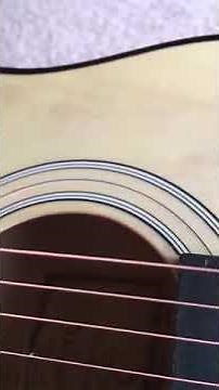 Slow-motion Vibrating Guitar String!