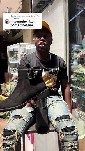 Stylish Saint Laurent Wyatt Boots Showcase on a Rainy Day