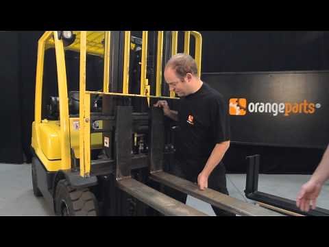 How to unlink the forklift forks?