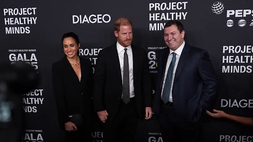 Meghan Markle stuns in black suit for rare red carpet appearance with Prince Harry