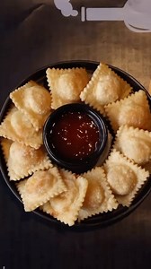 Crispy on the outside, cheesy on the inside! Our ravioli appetizer is a must-try. Indulge in every bite at pasta factory!🧀✨ #cheeselover #crispyravioli #perfectbite | Pasta Factory