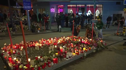 Swiss investigators believe sparkling candles atop wine bottles ignited fatal bar fire - AP Explains