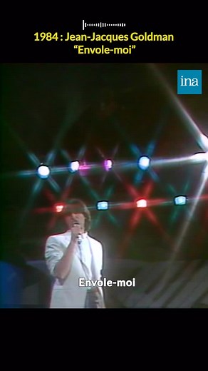 🎤Vendredi karaoké : Aujourd’hui, on chante “Envole-moi” de Jean-Jacques Goldman. 👉L’anecdote : “Envole-moi” donne voix à ceux qu’on laisse de côté dans les cités. Pas de fatalisme ici : le single célèbre la persévérance et l’espoir. #archives #ina #karaoke | INA