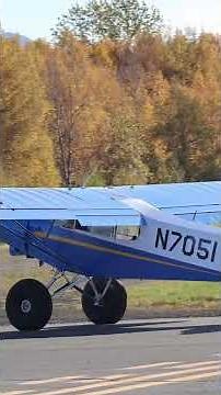 Alaska State Troopers Piper Super Cub Taking off Runway 32 at Lake Hood Strip.