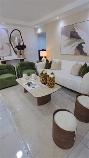 Emilia lopez on Instagram: "Una sala que equilibra armonía y elegancia: tonos neutros, acentos verdes y piezas de diseño que crean un ambiente acogedor y exclusivo. . Teléfono 829-963-4480 Visitanos: 📍Amy Flor Importaciones Calle Cibao Oeste #16, Local 2C. Los Cacicazgos. (Frente al Hotel Dominican Fiesta) . .#livingroom #livingroomdecor #livingroomideas #house homedecor homedesign homedecoration homedecorationideas decoration decohome decoracionhogar newcollection fabricantes importadora"