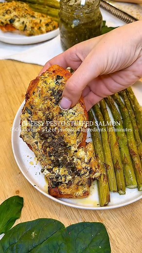 🔥CHEESY PESTO STUFFED SALMON ↓ ✅ SAVE & FOLLOW @fitfoodiestasia for more healthy easy recipes! Get my high protein cookbook (with OVER 170 easy recipes) linked on my profile page or comment “COOKBOOK” to have it sent to you‼️ • Low calorie, low carb, super high in protein… what’s not to love? Made with four simple ingredients and some mouthwatering spices, these easy stuffed salmon fillets are the perfect meal prep or dinner when you want to maximize flavour while minimizing effort! 👌🏼 This r