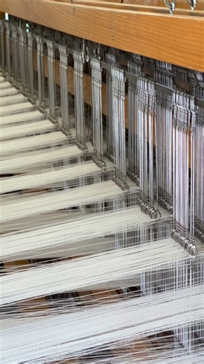 The Best Kind of Winter Blues. 🧵✨ Watching the shuttle fly is a reminder that the best things are made slowly, with intention. Here, the rhythm of the loom transforms dark blue wool into a timeless heirloom. | Swans Island Company