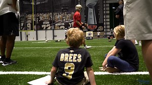 The Saints hosted the Duke family during a preseason practice in July, and they were able to sit in on a Quarterback Challenge filming! During the fliming, Drew Brees surprised them with the news that they were being honored as the Ochsner Heroes during the Miami preseason game. Meredith was the first patient to undergo a fetal surgery at Ochsner to repair her unborn son's spina bifida. Her son, Collin, is now a happy, healthy five-year-old who enjoys running around and playing baseball. Congrat