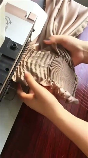 Stretching fabric with elastic threads to create a smocked pattern #popular #stretching #machine