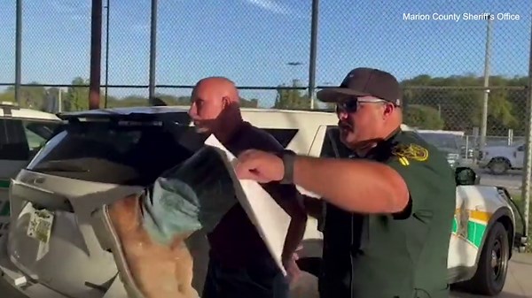 Florida man who raised thousands after husband's death charged with murder