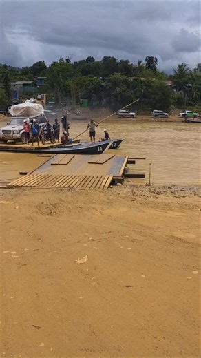 River Crossing Ferry Transporting Vehicles and Passengers Across Fast Current