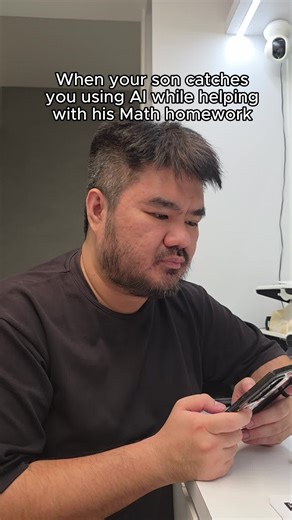 Dad Assists with Homework: Humorous Father-Son Moments