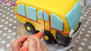 Learn how to bake this amazing Wheels on the Bus cake! | HooplaKidz