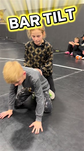 Arm Bar Tilt 🔨 Alpha member @madddawg_wrestles breaks down the bar tilt. She starts with a chop to secure the cross-wrist, then uses the free arm to knife through and lock up the arm bar. From there, jump sides, drive your right knee into your opponent’s hip pocket, and pull them in tight to finish in the master tilt position. Follow for everything wrestling 🤼‍♀️ | Sarbacker Wrestling Academy