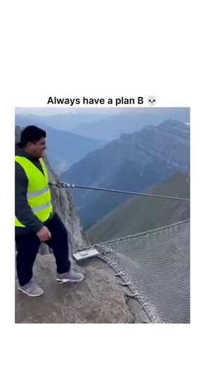 GlobalReelsHub on Instagram: "Trusting the first plan always feels safe… until the exact moment it fails — this video titled “Always Have a Plan B” captures a heart-pounding sequence where a man jumps from a hill with full confidence, believing the safety net below will do its job, but in a terrifying split second the net tears apart, turning a controlled stunt into pure free fall, gravity taking over as panic replaces certainty and the ground rushes closer with no mercy, and just when it looks 