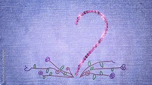 Sequin love heart and flowers embroidered on denim jeans. Last three seconds is a loop. For weddings, Valentine's Day, or other romantic occasions.