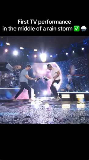 AJR on Instagram: "First TV performance in the middle of a rain storm ✅ 🌧️"