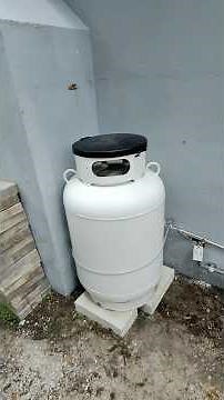 Installing a propane tank 🧱 #propane #diy #plumbing #beforeandafter #service #gasline #installation