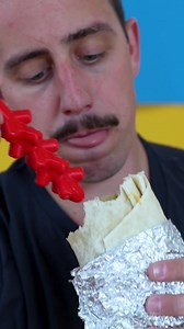 Hot Sauce Syringe™️ Evenly coat your burrito in hot sauce with ease. Using our proprietary multi-stem technology, insert our latest device down the center of your burrito to release a flood of hot sauce into corner and across every ingredient simply at the push of a single button. Enjoy each and every bite perfectly coated in your favorite spicy seasoning! | Unnecessary Inventions