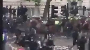 Police officer falls off horse at BLM protest in London