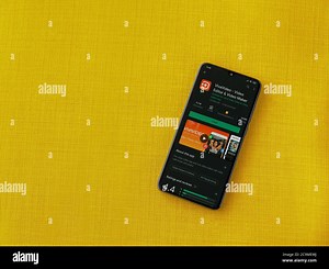 Lod, Israel - July 8, 2020: VivaVideo - Video Editor and Movie Maker app play store page on the display of a black mobile smartphone on a yellow fabri Stock Photo - Alamy