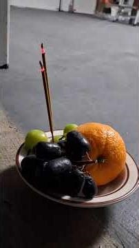 Burning incense sticks produce a thin, rising, often helical stream of smoke