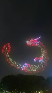 32K views · 1.4K reactions | As the Dragon Boat Festival is approaching, 1,400 drones created a light show of a flying giant dragon in the sky of Shenzhen, a city known for its technologies located in southeast China’s Guangdong Province. Take a look at how modern technologies blend with a traditional festival. #China #drone #footage #technology #traditional #festival #intangibleculturalheritage #IntangibleHeritage | CGTN China24 | Facebook