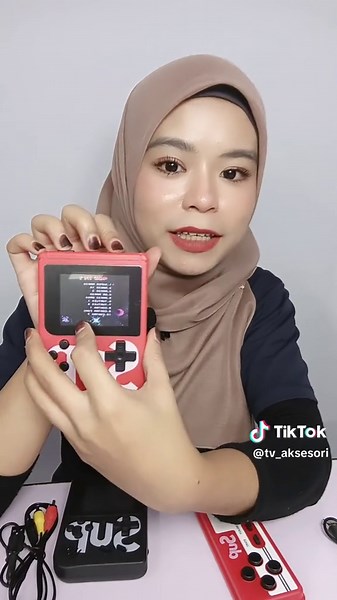 Main Gameboy di TV Besar dengan Gameboy Player