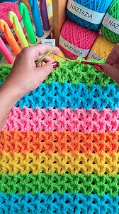Crochet V Stitch pattern, in this tutorial from Naztazia, is a textured type of the vintage version. This one uses double crochet, chain one, double crochet, along with front post stitches to the right and left. #reels #crochet #knitting #artist #makersgonnamake #yarn #crochetlove #grannysquare #crochetblanket #tutorial #naztazia | Naztazia