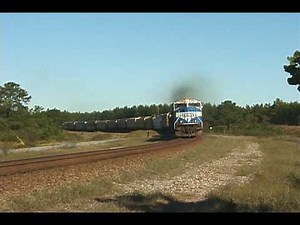 CSXT Loaded Grain Train G124 at Junction City, Georgia with Conrail SD70MAC Leading