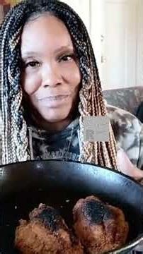 Black Burnt Fish Presented in a Frying Pan