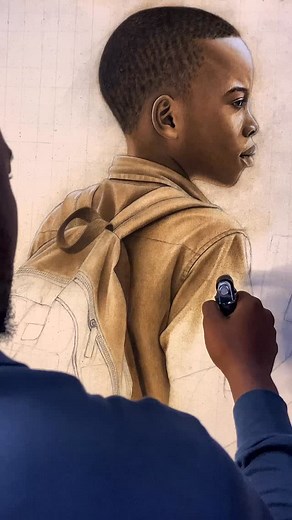 Got into the studio only to find out that my son had taken a pencil and help me correct the proportion of the the subjects backpack. Anyways i appreciate his help😭🤣😭. Regardless I’m enjoy burning this backpack it’s just so satisfying! What do you think? #art #artist #pyrography #fire #pyro #artpostle #pyrographyart #fireart #artpostleoffire #faith #cup | Samuel Ume