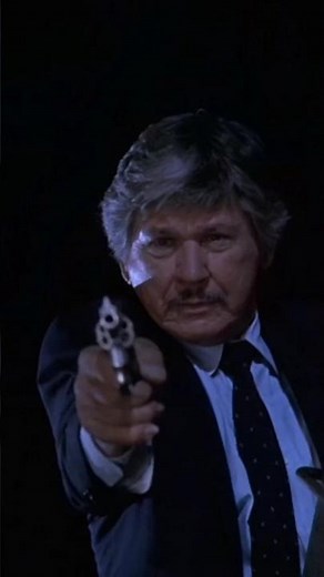 Charles Bronson uses a Smith & Wesson Model 66. Kinjite: Forbidden Subjects(1989). J. Lee Thompson 📽
