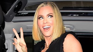 Jenny McCarthy shows off ageless body in black lace dress and fishnets in NYC