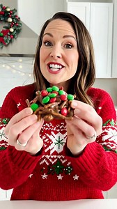 🎉🍫 Holiday Haystack Ting-a-Lings 🍫🎉 Ingredients: 1 (12-ounce) can chow mein noodles 1 (11-ounce) bag semi-sweet chocolate chips 3/4 cup Nutella hazelnut spread 1/2 cup hazelnuts, chopped (or any nut of your choice) 1/2 cup red and green M&M candies (mini or regular) Directions: Prepare the Noodles: Place the chow mein noodles in a large mixing bowl and set aside. Melt the Chocolate: Using a double boiler, add the semi-sweet chocolate chips and melt over medium heat, stirring occasionally unt