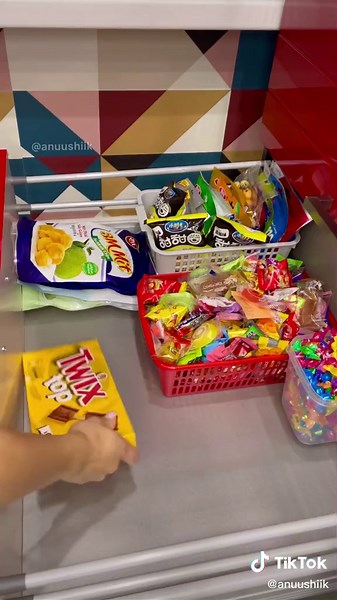 Organizing a Snack Drawer with Colorful Treats