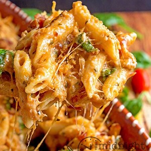 133K views · 15 shares | ☆☆CHEESY PESTO BACON PASTA BAKE☆☆ Serve up this tasty pasta bake for dinner and watch it disappear because everyone will want seconds and even thirds!! Simply delicious! PIN IT: https://www.pinterest.com/pin/95349717094808646/ RECIPE: https://bakeatmidnite.com/cheesy-pesto-bacon-pasta-bake/ | The Midnight Baker | Facebook